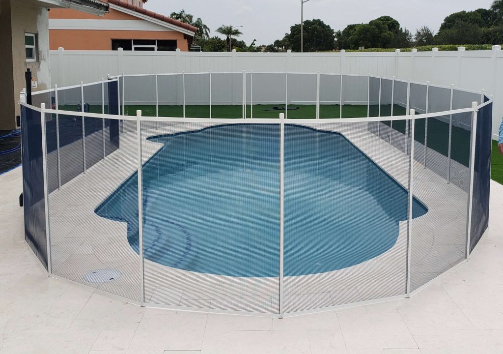 Premium Blue and White Pool Safety Fence by Pool Guard of Naples