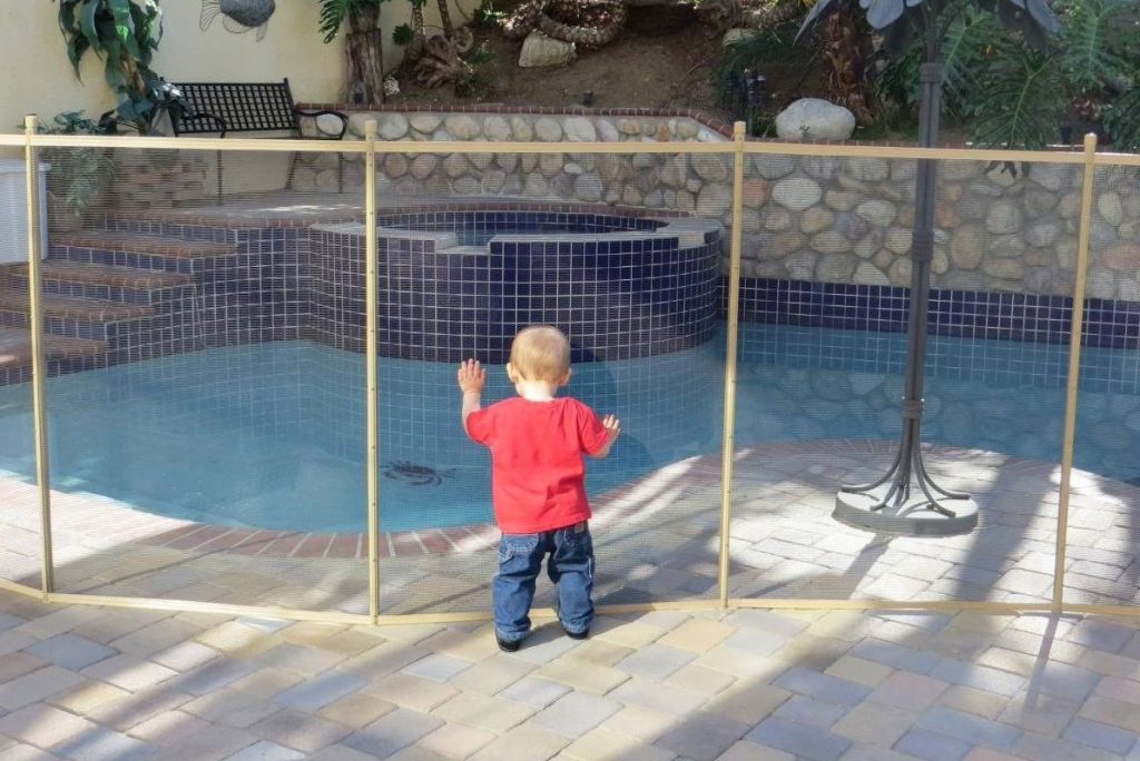 pool safety nets vs fences