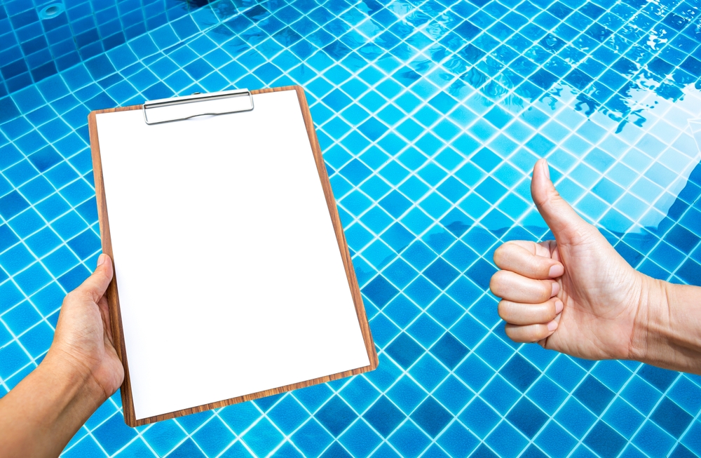 does insurance require a fence around a pool: insurance company inspecting the pool
