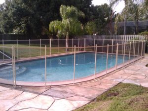 Mesh pool fence installation for backyard safety in Lakeland Florida