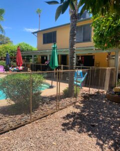 Gilbert pool fence providing effective and attractive protection around an attractive pool
