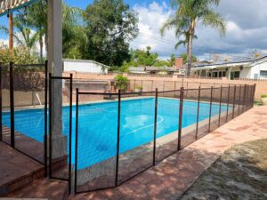 Gilbert pool fence providing secure and stylish protection around a sparkling pool