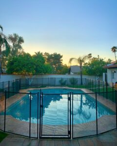 Gilbert pool fence providing secure and stylish protection around a sparkling pool