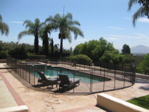 Pool fence in Santa Barbara with elegant and safe protection, ensuring pool area safety