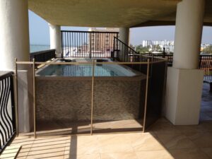 Pool safety fence installation on a rooftop in Fort Worth, TX, providing protection while allowing for an unobstructed view.
