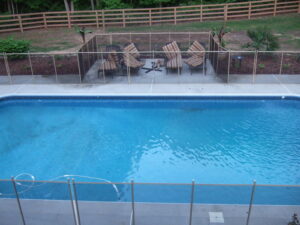 fort-pierce-pool-fence-around-backyard-pool-and-patio