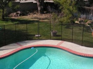 san-clemente-pool-fence-brick-edging