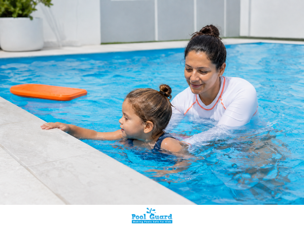 Professional Swimmer Giving Swimming Lessons to a Little Girl